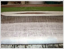 Weaving on a rigid heddle loom - a shawl in progress
