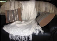 Throws an cushions in 100% angora, knitted, woven and round